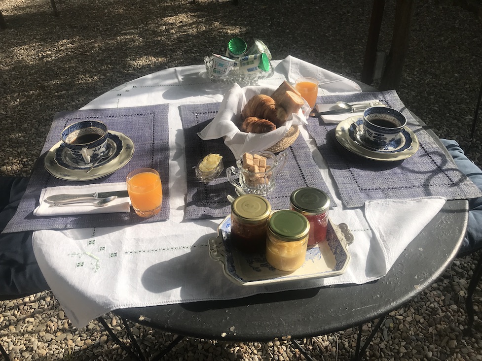 Delicious breakfast under the pergola at the Chai de Marguerite